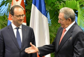 Cuba announces France oil deal as Hollande urges end to US trade embargo
